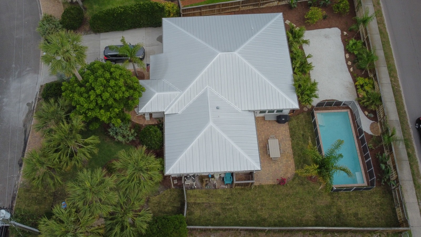 Drone view of Pearson residence - Atlantic Beach FL swimming pool landscaping design and hardscapes by Rockaway