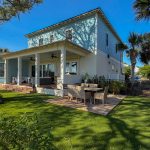 Backyard transformed with fairway-inspired landscape in Atlantic Beach, FL